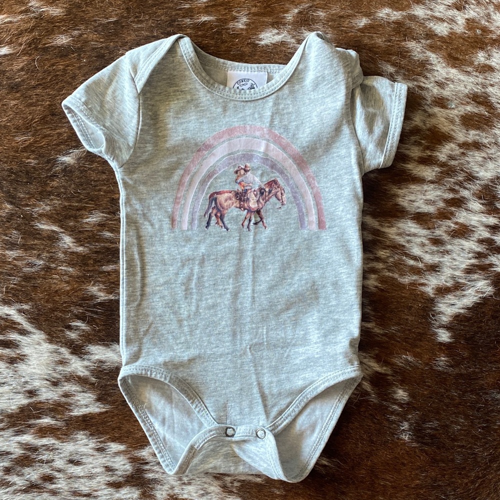 Cowkid Clothing Company girl’s rainbow baby onesie